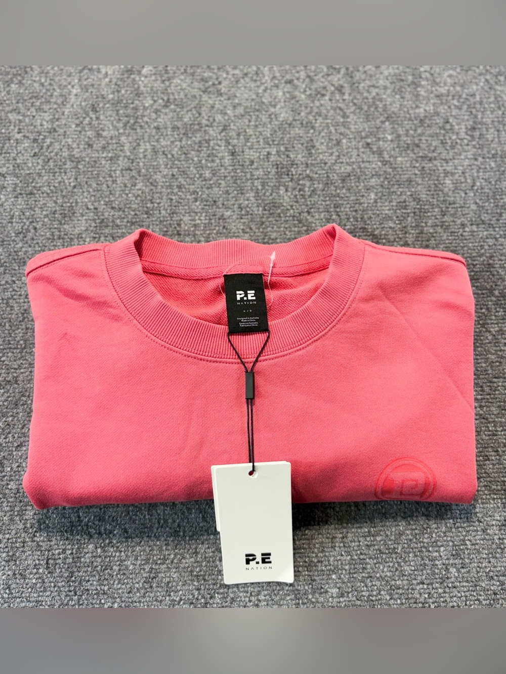 NWT P.E Nation Sz L Cropped Crewneck Sweatshirt Pink Coral Washed Poppy
Red Logo